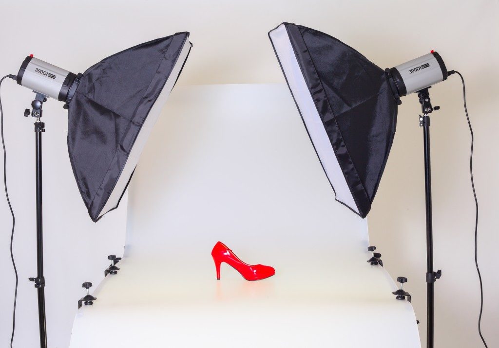 taking photos of a retail shoe in a studio