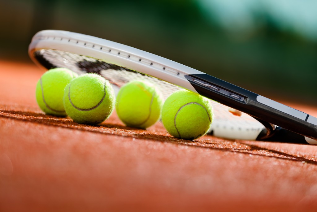 tennis balls and racket