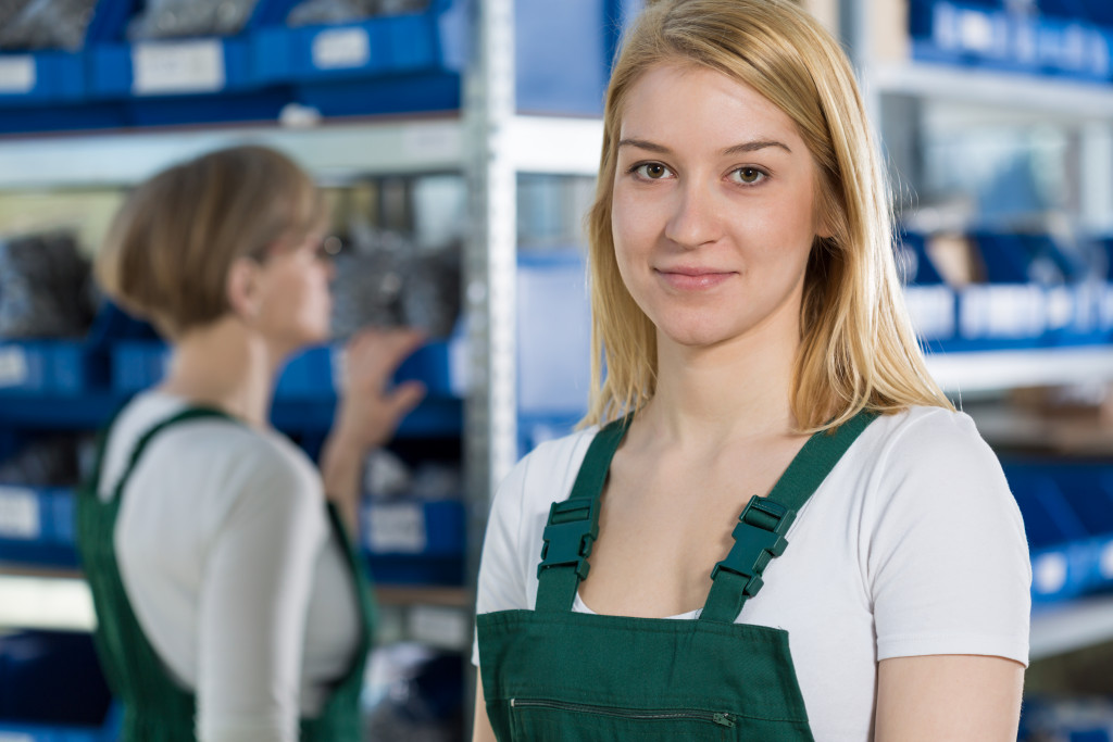 beautiful and young warehouse employee