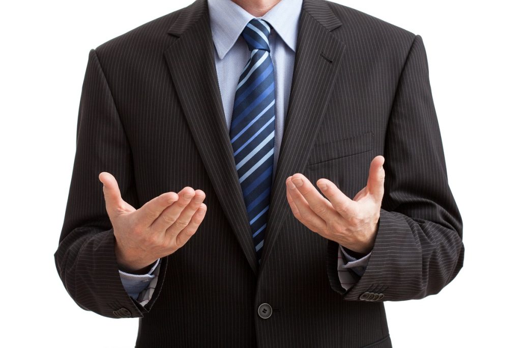 A businessman using his hands while explaining